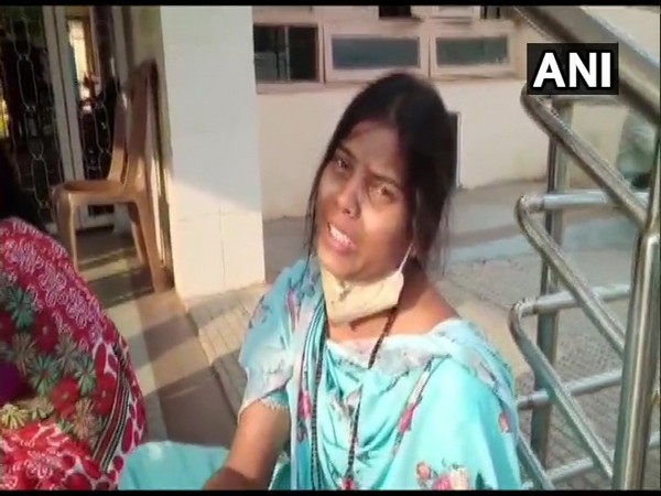A woman crying outside Chamrajnagar hospital. (Photo.ANI)