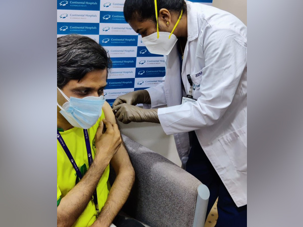 Deepak Sapra, Global Head of Custom Pharma Services at Dr Reddy's Laboratories receives the first jab of the vaccine in Hyderabad.