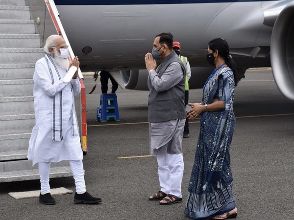 PM Narendra Modi reached Gujarat  to review damage (photo/Twitter)