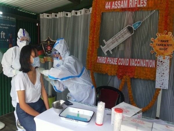 Healthcare workers administer COVID-19 vaccine in Tamenglong.