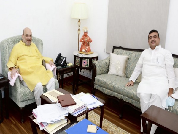 Union Home Minister Amit Shah (L) and BJP leader Suvendu Adhikari (R) in Delhi (Photo/ANI)