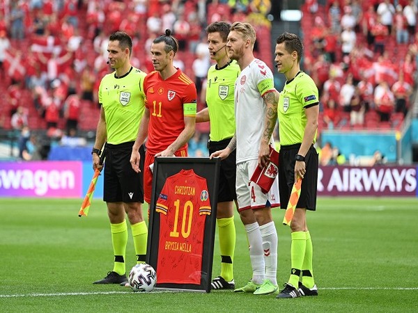 Kjaer, Gareth Bale and match officials  (Image: UEFA Euro 2020's Twitter)