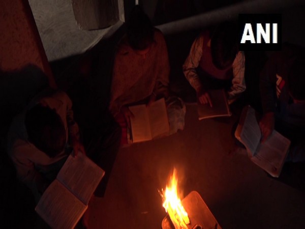 Students of Ladha studing using firewood (Photo/ANI)