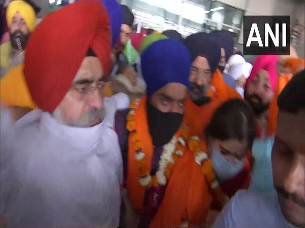 Manjinder Singh Sirsa while receiving vistim of forceful conversion at Delhi airport (Photo/ANI)