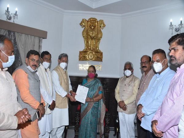 Uttarakhand Chief Minister Tirath Singh Rawat handing over his resignation letter to Governor Baby Rani Maurya at Raj Bhavan