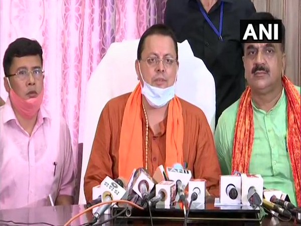 BJP MLA Pushkar Singh Dhami (Centre) (Photo/ANI)