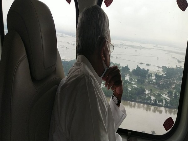Bihar CM Nitish Kumar making aerial survey
