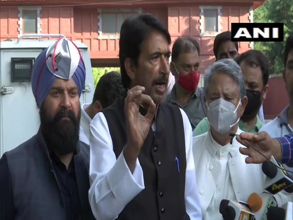 Congress Jammu and Kashmir unit chief GA Mir speaking to reporters in Srinagar on Tuesday. [Photo/ANI]