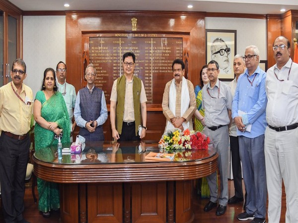 Union Law and Justice Minister Kiren Rijiju (centre) with senior officials (Photo/ANI)