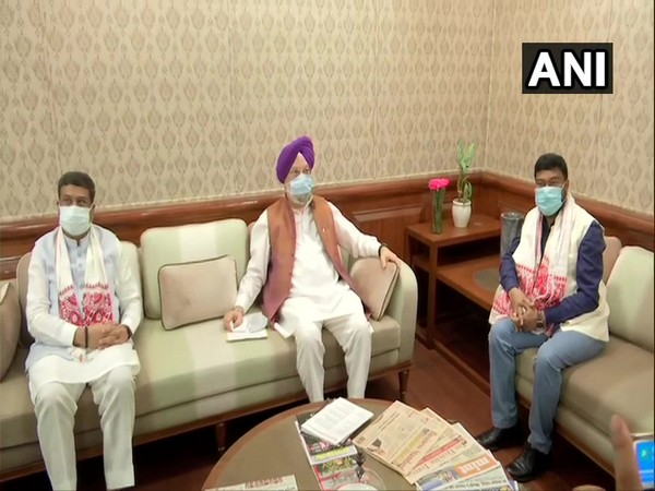 Minister of Petroleum and Natural Gas Hardeep Singh Puri with Minister Dharmendra Pradhan and MoS Rameswar Teli  (photo/ANI)