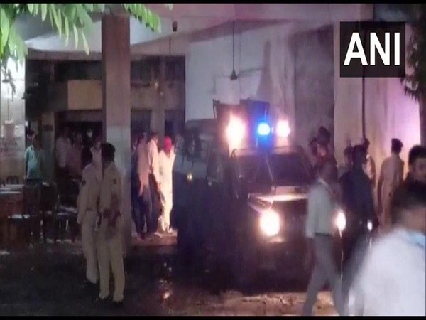 Gangster Ravi Pujari (in red cap) being produced before the Additional Chief Judicial Magistrate Court of Borsad court. (Photo/ANI)