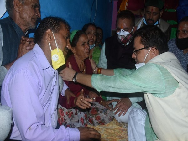 Uttarakhand Chief Minister Pushkar Singh Dhami meeting families of the people who died following a cloudburst.(Photo/ANI) 