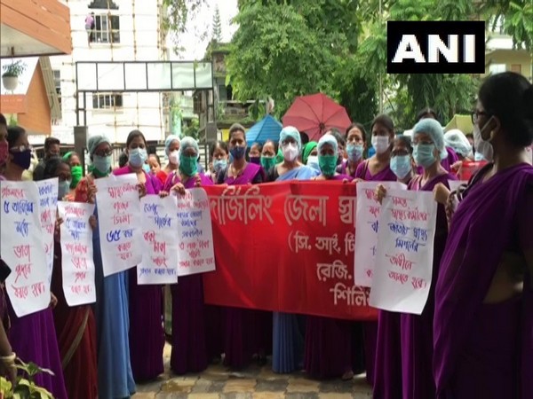 ASHA workers protest in Siliguri on Tuesday. [Photo/ANI]