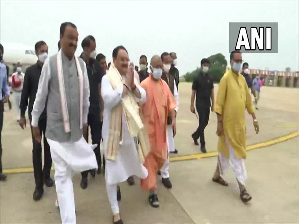 BJP national president JP Nadda (Centre), Uttar Pradesh CM Yogi Adityanath (Right) and Deputy CM Keshav Prasad Maurya (Left) at Lucknow airport (Photo/ANI)