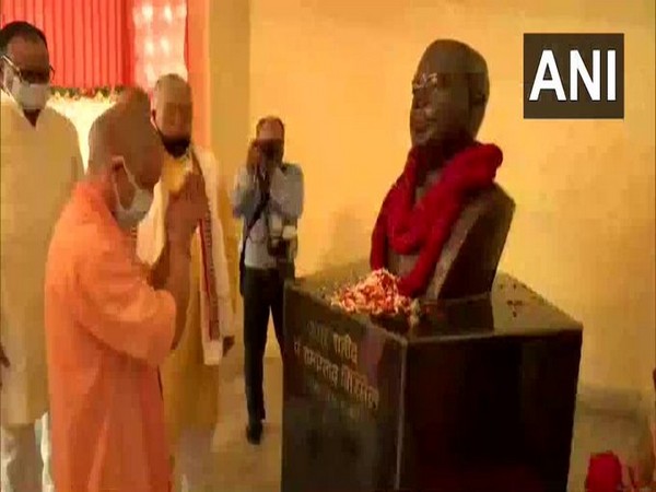 Chief Minister Yogi Adityanath paying floral tribute to the statue of Ram Prasad Bismil at Kakori Shaheed Smarak, on the anniversary of 'Kakori train action' (file pic /ANI)