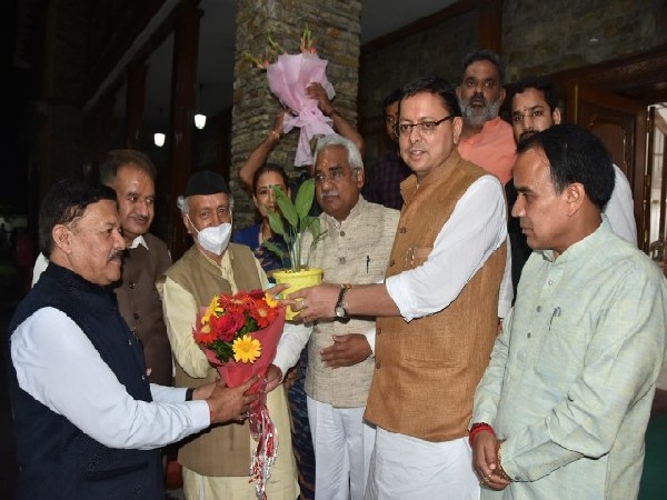 Uttarakhand Chief Minister Pushkar Singh Dhami with Maharashtra Governor Bhagat Singh Koshyari (Photo/ANI)