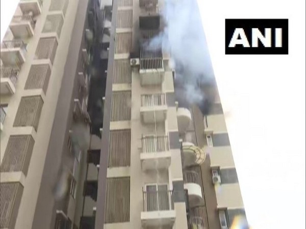 Major fire at Ganesh Genesis residential building in Gota on Friday. Photo/ANI