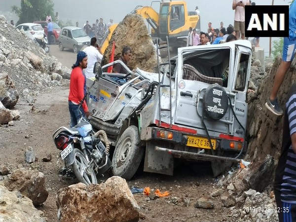 The incident took place at NH 94 (Rishikesh-Gangotri) when a boulder fell on the car carrying 'kaanwariyas'.