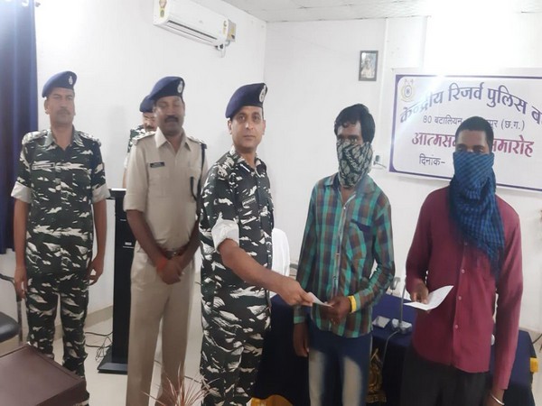 Two naxals surrendering at 80 Battalion CRPF camp in Jagdalpur, Chhattisgarh on Saturday. Photo/ANI