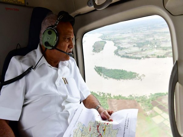 Chief Minister BS Yediyurappa conducting aerial survey of flood-affected areas in Karnataka on Monday. Photo/ANI
