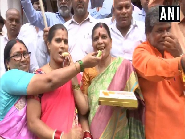 BJP Telangana unit party workers celebrating in Hyderabad.