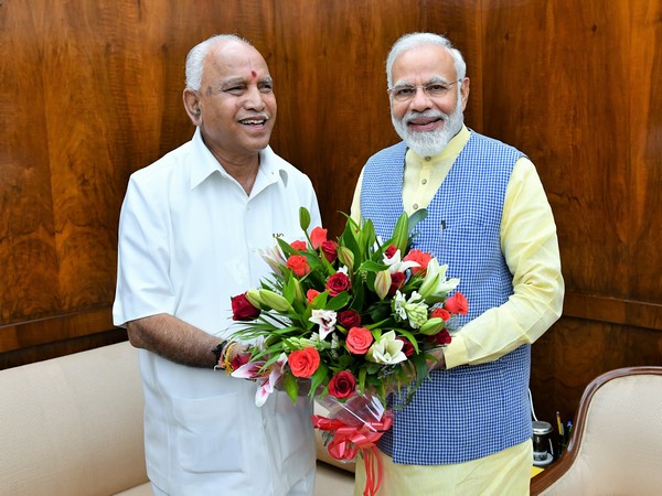 Prime Minister Narendra Modi (right) with Karnataka Chief Minister BS Yediyurappa (left). (Photo: PMOIndia)