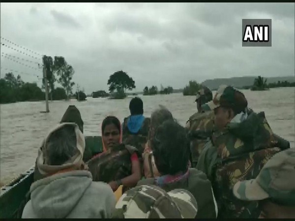 Army rescuing people in flooded-affected areas of Karnataka on Thursday. 