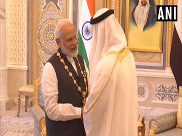 Crown Prince of Abu Dhabi Sheikh Mohammed bin Zayed Al Nahyan conferring Order of Zayed to Prime Minister Narendra Modi
