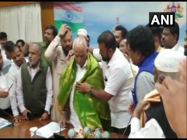 Karnataka Chief Minister BS Yediyurappa meets minority leaders in his office on Wednesday. Photo/ANI