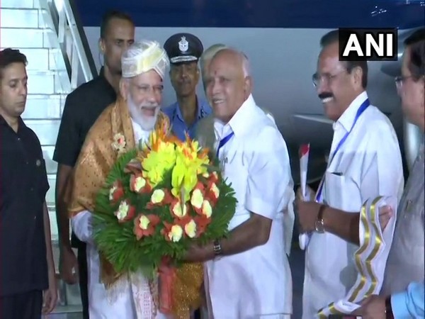 Prime Minister Narendra Modi was received by Chief Minister BS Yediyurappa in Bengaluru on Friday.