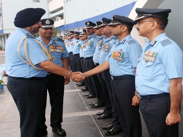 Air Chief Marshal BS Dhanoa and Air Marshal R Nambiar, Western Air Command, met officers before the Western Air Commanders' Conference in New Delhi on Friday. 
