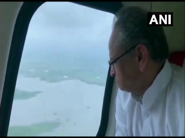 Chief Minister Ashok Gehlot while conducting an aerial survey of the flood affected region on Monday. Photo/ANI