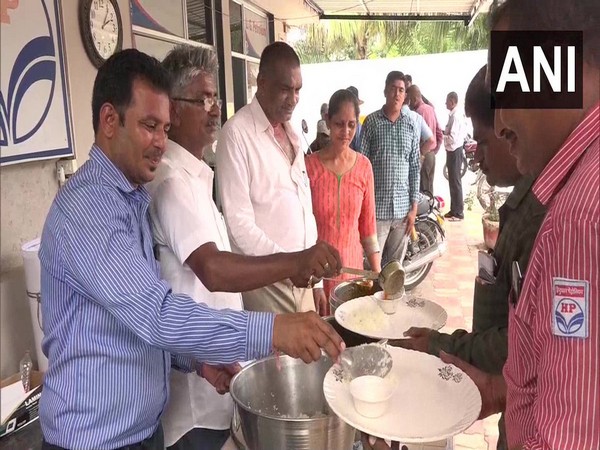 Customers enjoying refreshments at petrol pump in Gujarat’s Vadodara city on Monday. Photo/ANI