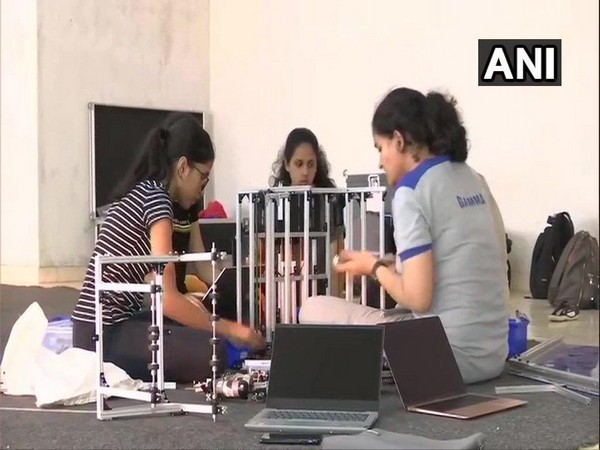 The girls are building a robot that can pick up pollutants from the ground and put it on a higher level. Photo/ANI
