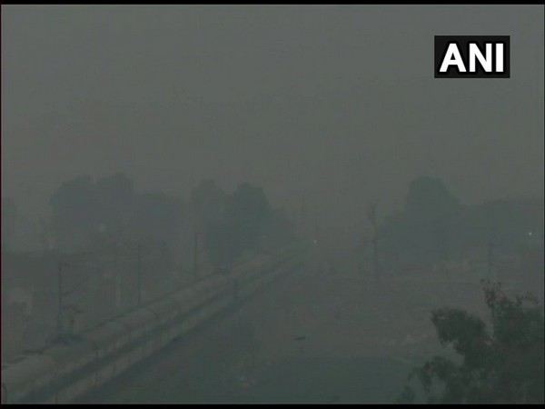 A thick layer of haze blankets Hapur city on Monday morning. Photo/ANI