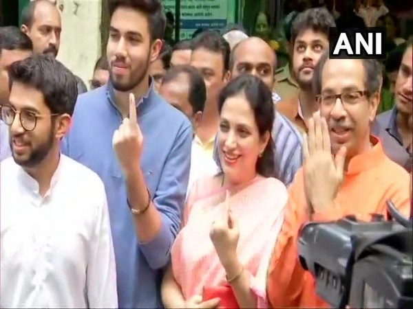 Mumbai: Shiv Sena Chief Uddhav Thackeray, wife Rashmi and sons Aditya and Tejas, after casting their vote in Bandra(East). Photo/ANI