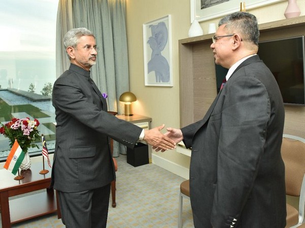External Affairs Minister S Jaishankar and his Malaysian counterpart Saifuddin Abdullah at Baku, Malaysia, on Wednesday. 