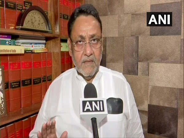 NCP leader Nawab Malik speaking to ANI on Sunday. Photo/ANI