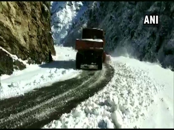 Snow clearing operations taking place at the Mughal road on Monday.