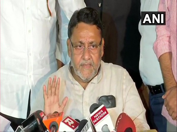 NCP leader Nawab Malik speaking to reporters on Monday. Photo/ANI