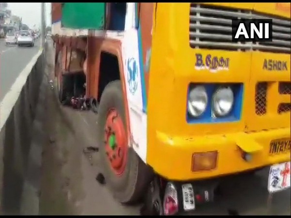 Truck hits a woman riding a scooty in Coimbatore on Monday. Photo/ANI