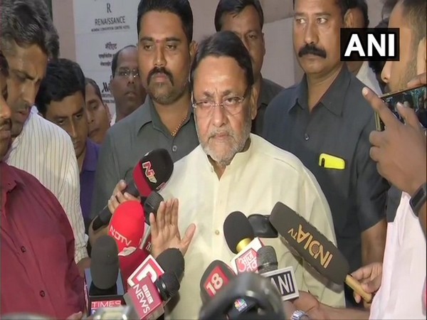 NCP leader Nawab Malik speaking to reporters in Mumbai on Sunday. Photo/ANI