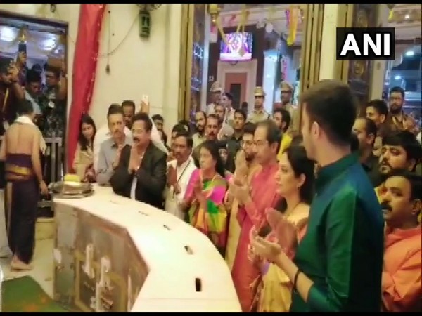 Uddhav Thackeray along with family offering prayers at Siddhivinayak Temple in Mumbai on Thursday. Photo/ANI