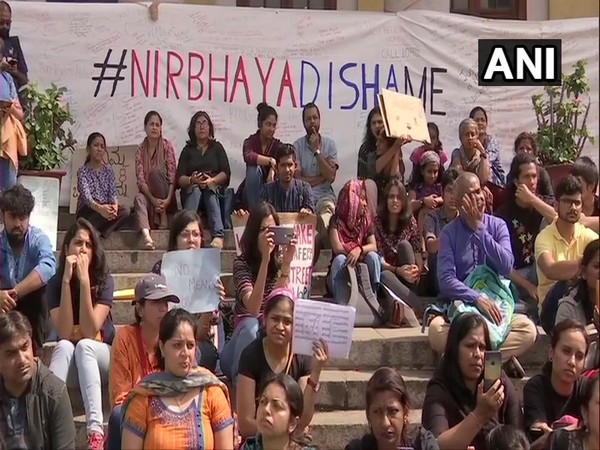 Locals protesting crimes against women in Bengaluru on Sunday.