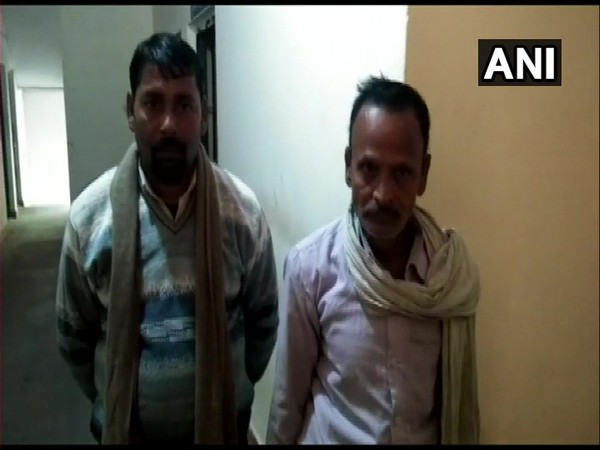 The accused being taken into custody on Saturday