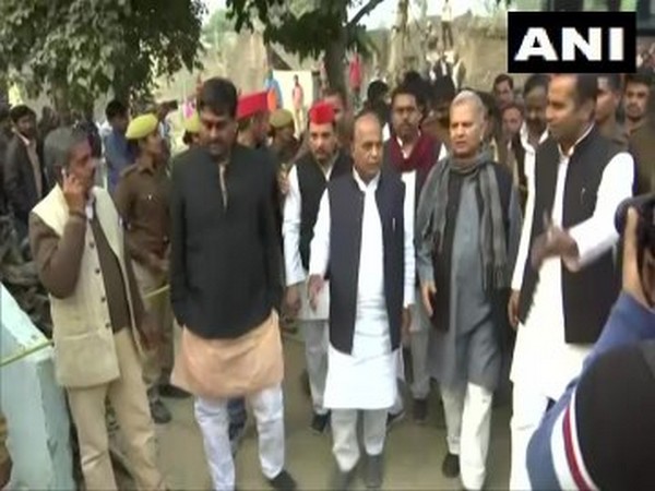 SP leaders visit village on Saturday where Unnao rape victim was set on fire. Photo/ANI