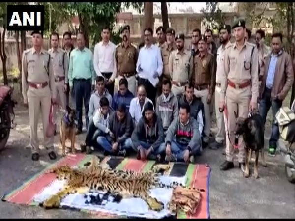 Forest officials with nine accused (Photo/ANI)