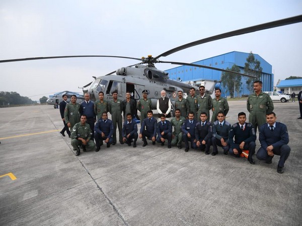 Prime Minister Narendra Modi with IAF personnel at the Air Force Station in Kanpur on Saturday.