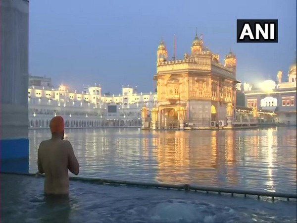 Devotees also took a holy dip in the Sarovar in front of the Golden Temple on Thursday in Amritsar. Photo/ANI