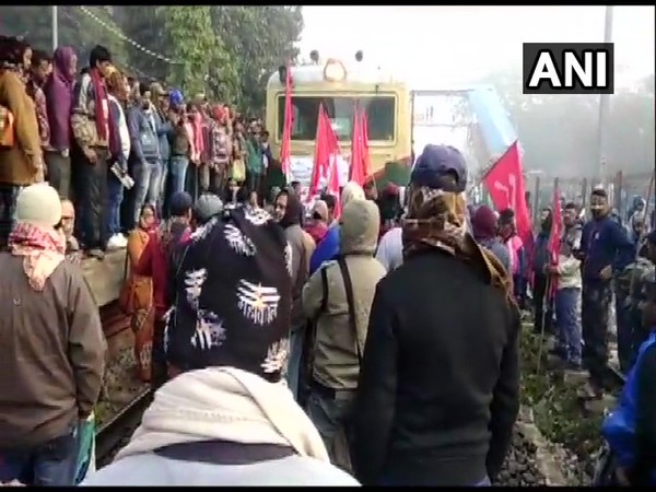 Protesters block railway track in Kanchrapara,North 24 Parganas on Wednesday. (Photo/ANI)